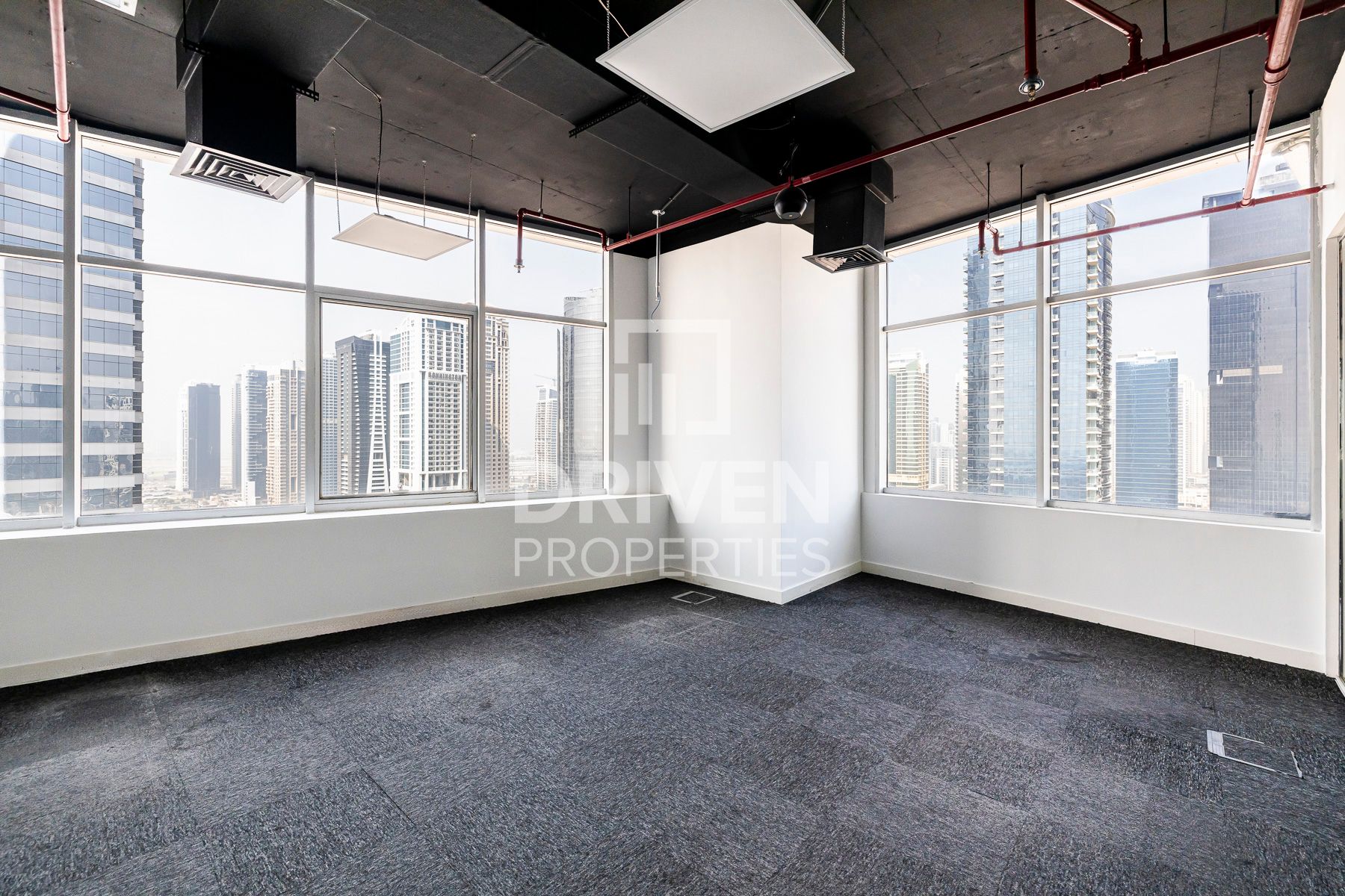 Partitioned Office Corner with Skyline View