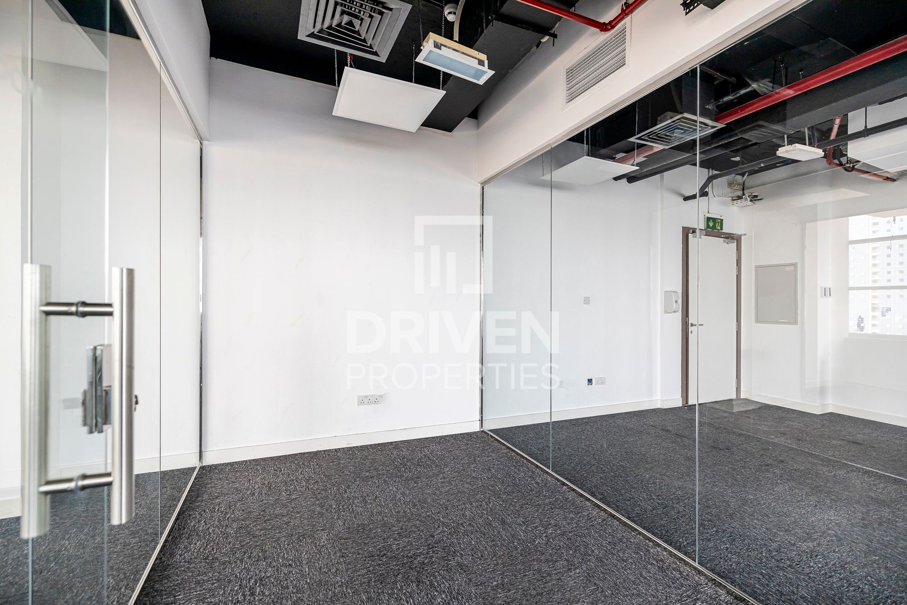 Partitioned Office Corner with Skyline View