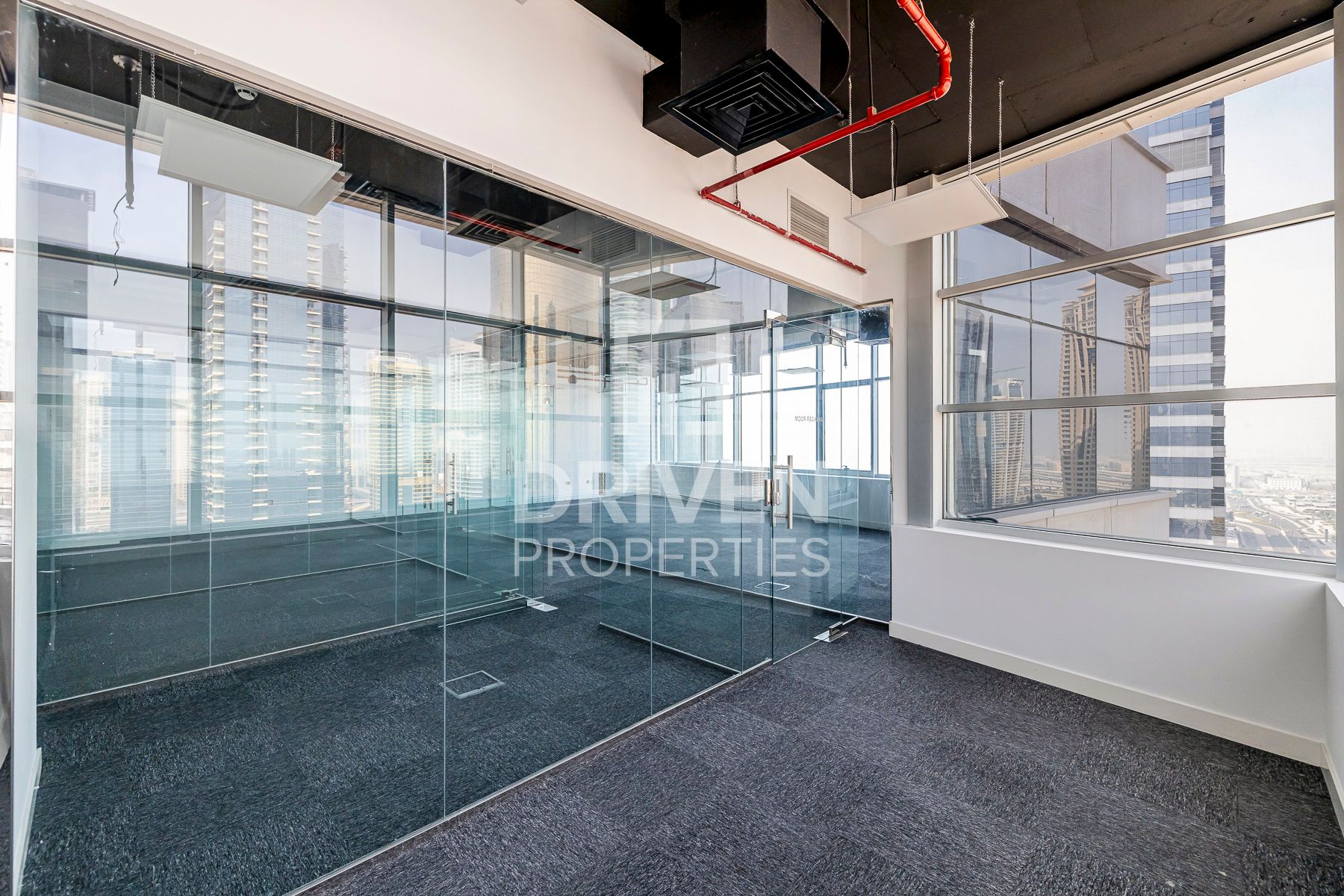 Partitioned Office Corner with Skyline View