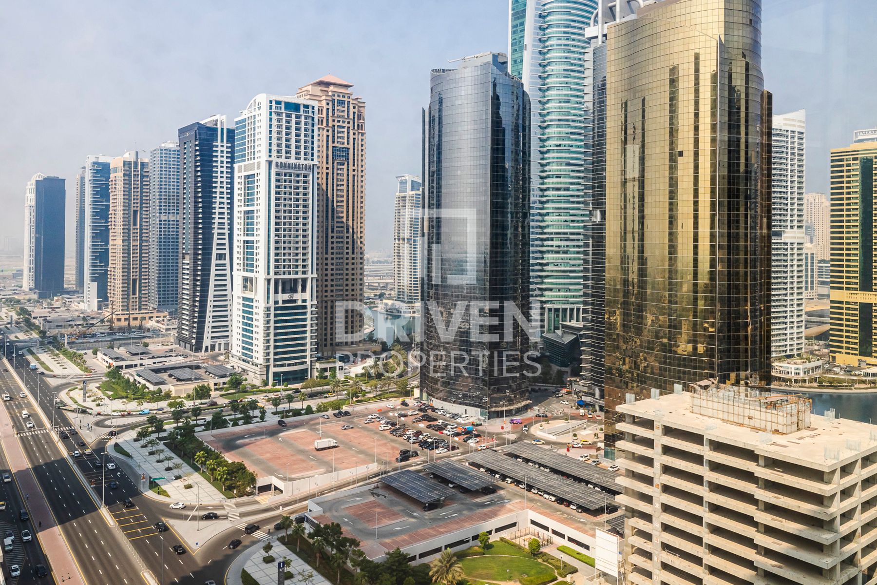 Partitioned Office Corner with Skyline View