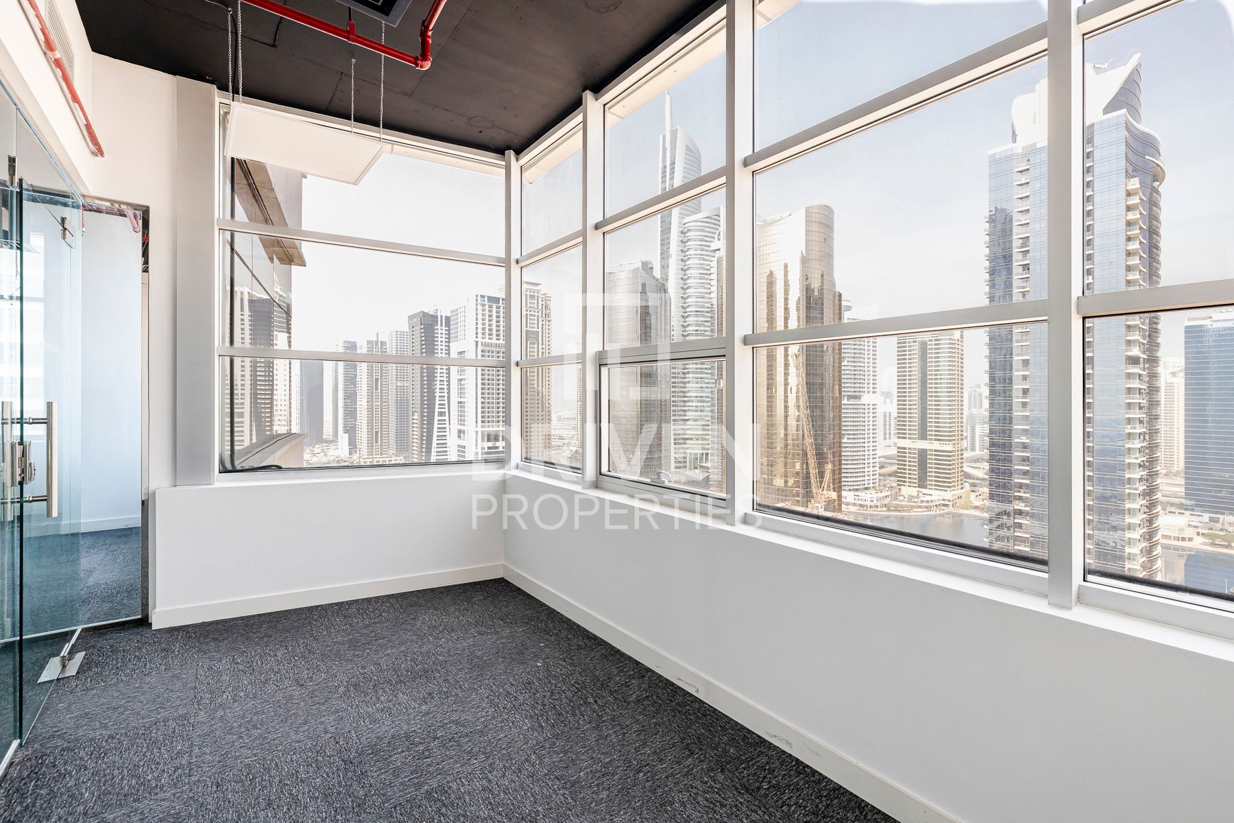 Partitioned Office Corner with Skyline View