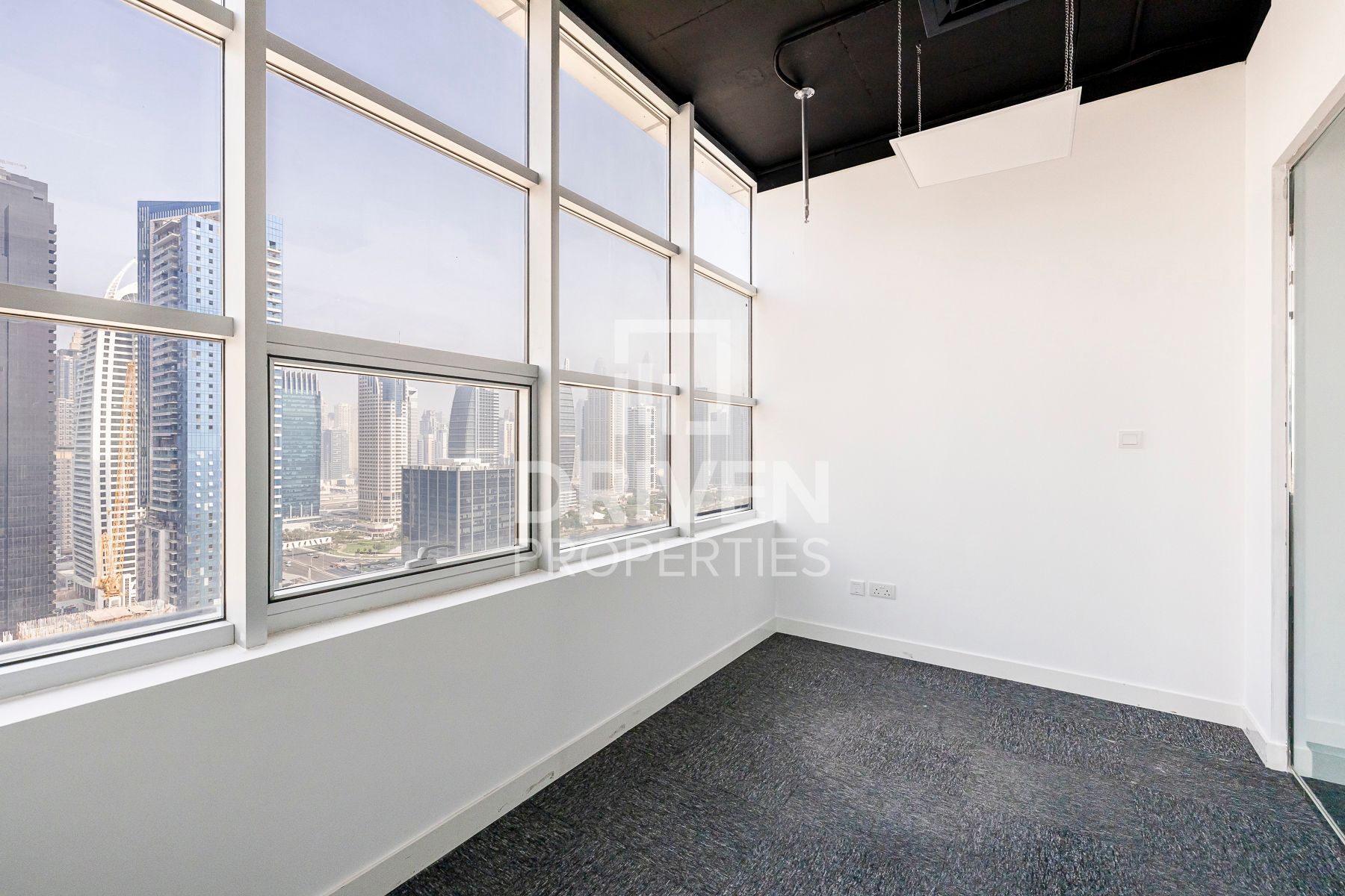 Partitioned Office Corner with Skyline View