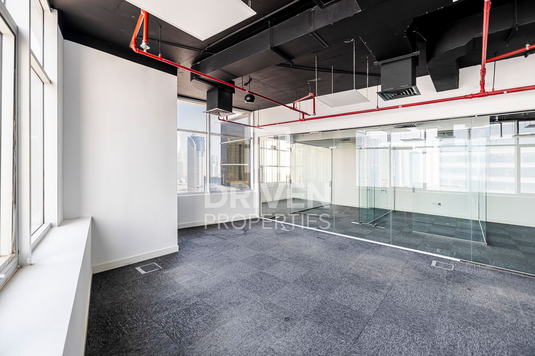Partitioned Office Corner with Skyline View